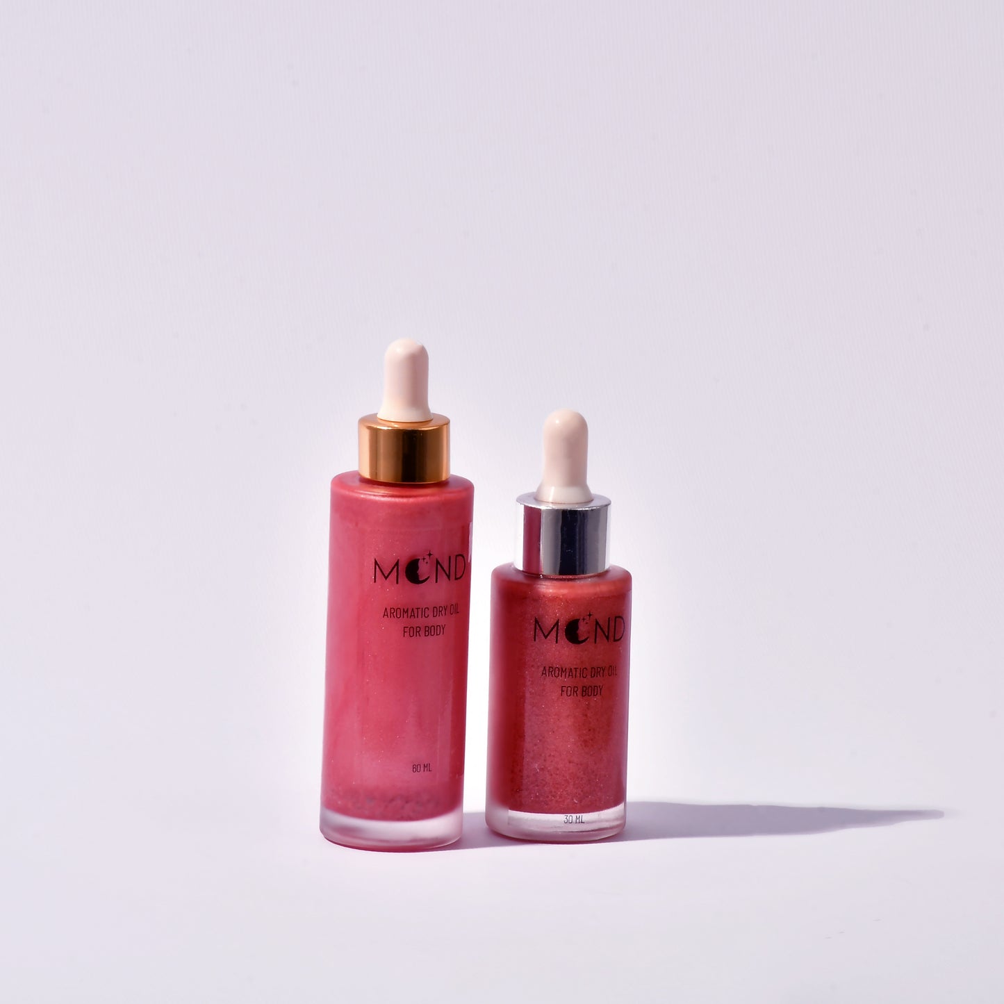 Pink shimmering dry oil