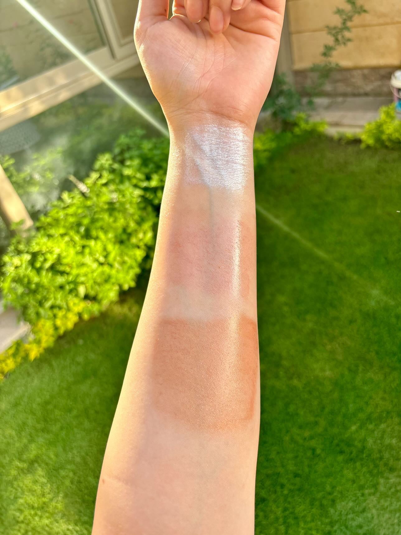 Holographic shimmering dry oil.